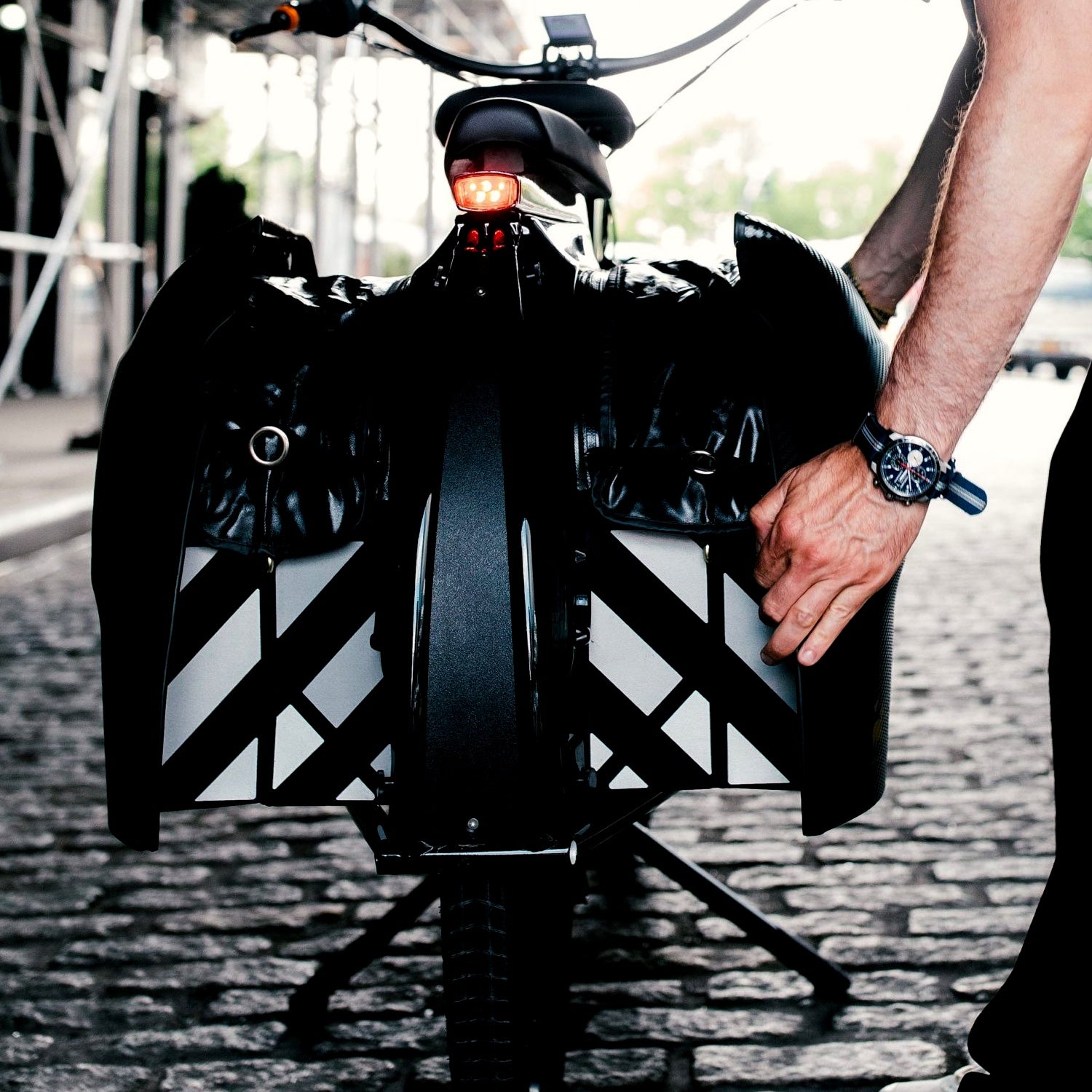 Expanding the panniers on cobblestone streets.