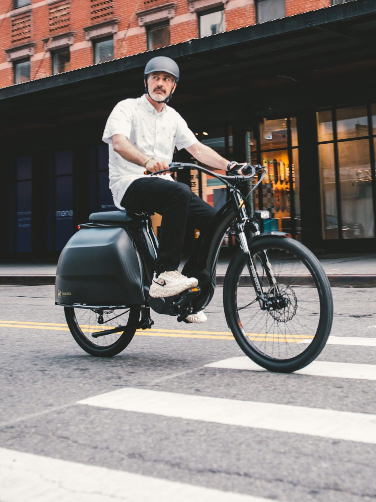 A side view of a Zach riding the Civ in NYC.